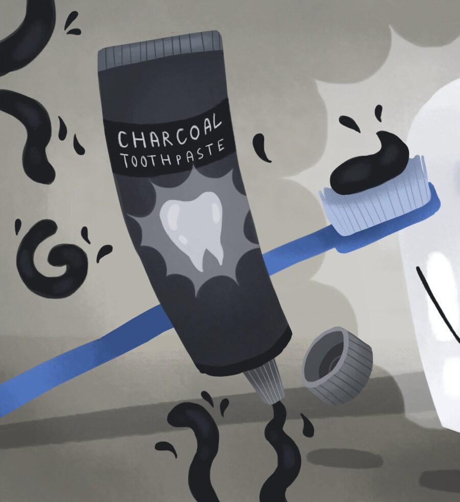 Illustration of charcoal toothpaste next to a blue toothbrush