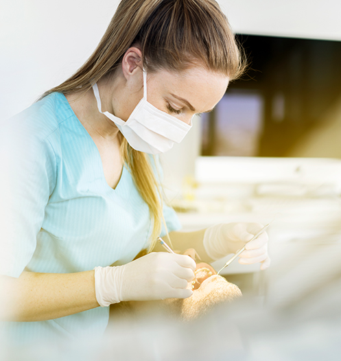 dental associate working on patient