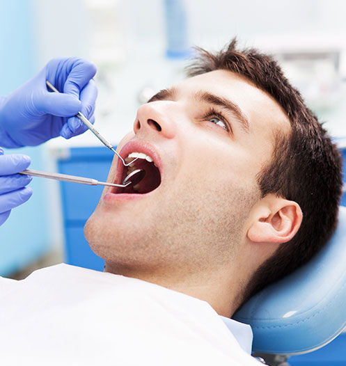 man at the dentist